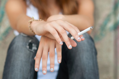 Teenage,Hands,Holding,Cigarette.